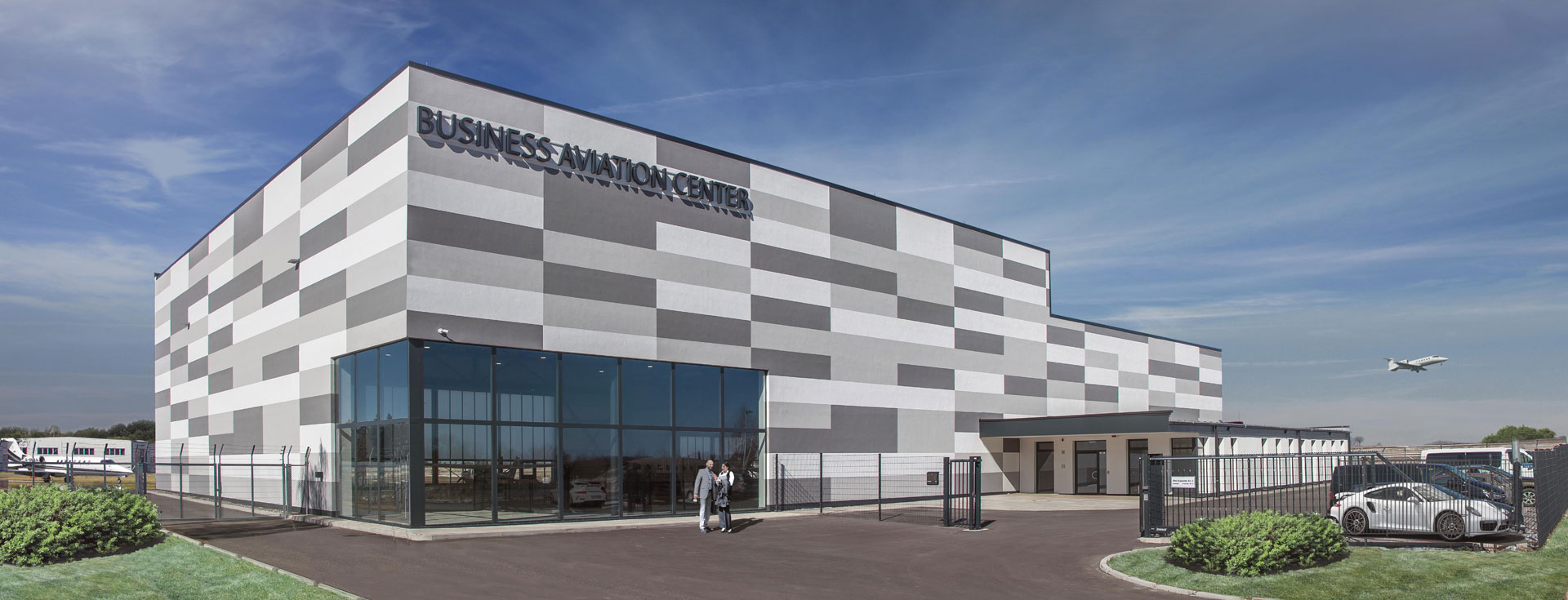 Exterior of the Business Aviation Center Braunschweig, showing the hangar and entrance