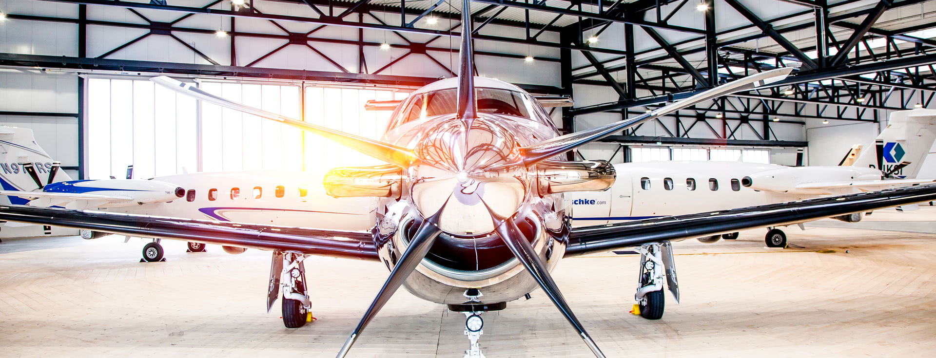 Aircraft inside a hangar, from TAKE C’AIR’s original website